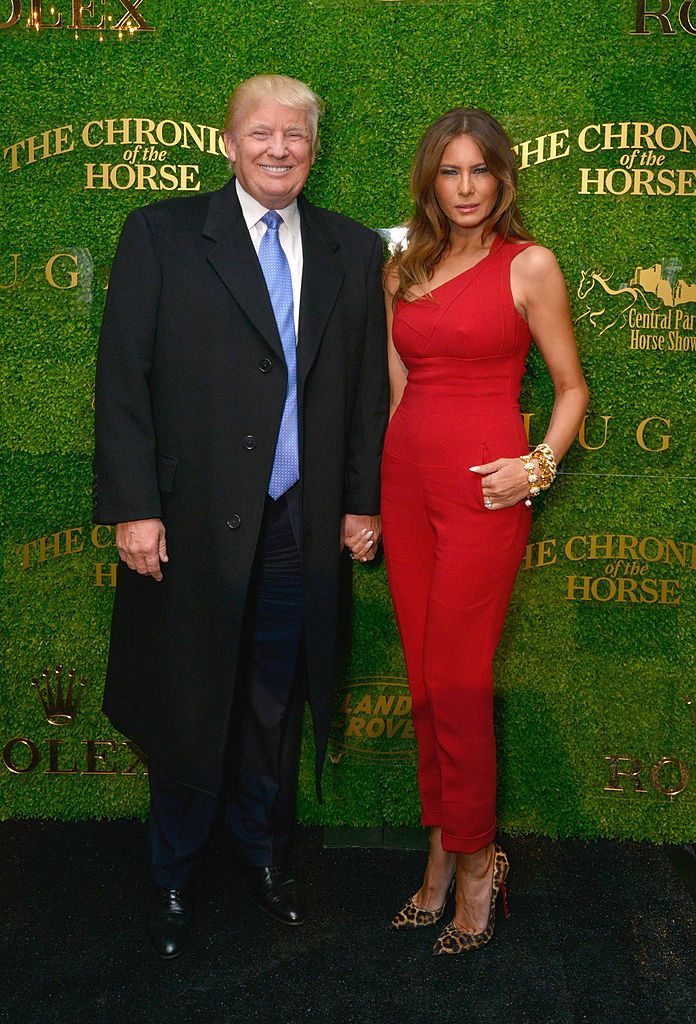 NEW YORK, NY - SEPTEMBER 18: Donald Trump (L) and Melania Trump attend Central Park Horse Show presented by Rolex and produced by Chronicle of the Horse where Land Rover was the official vehicle on September 18, 2014 in New York City. (Photo by Eugene Gologursky/Getty Images for Land Rover)